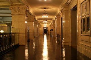 A view down a long white corridor